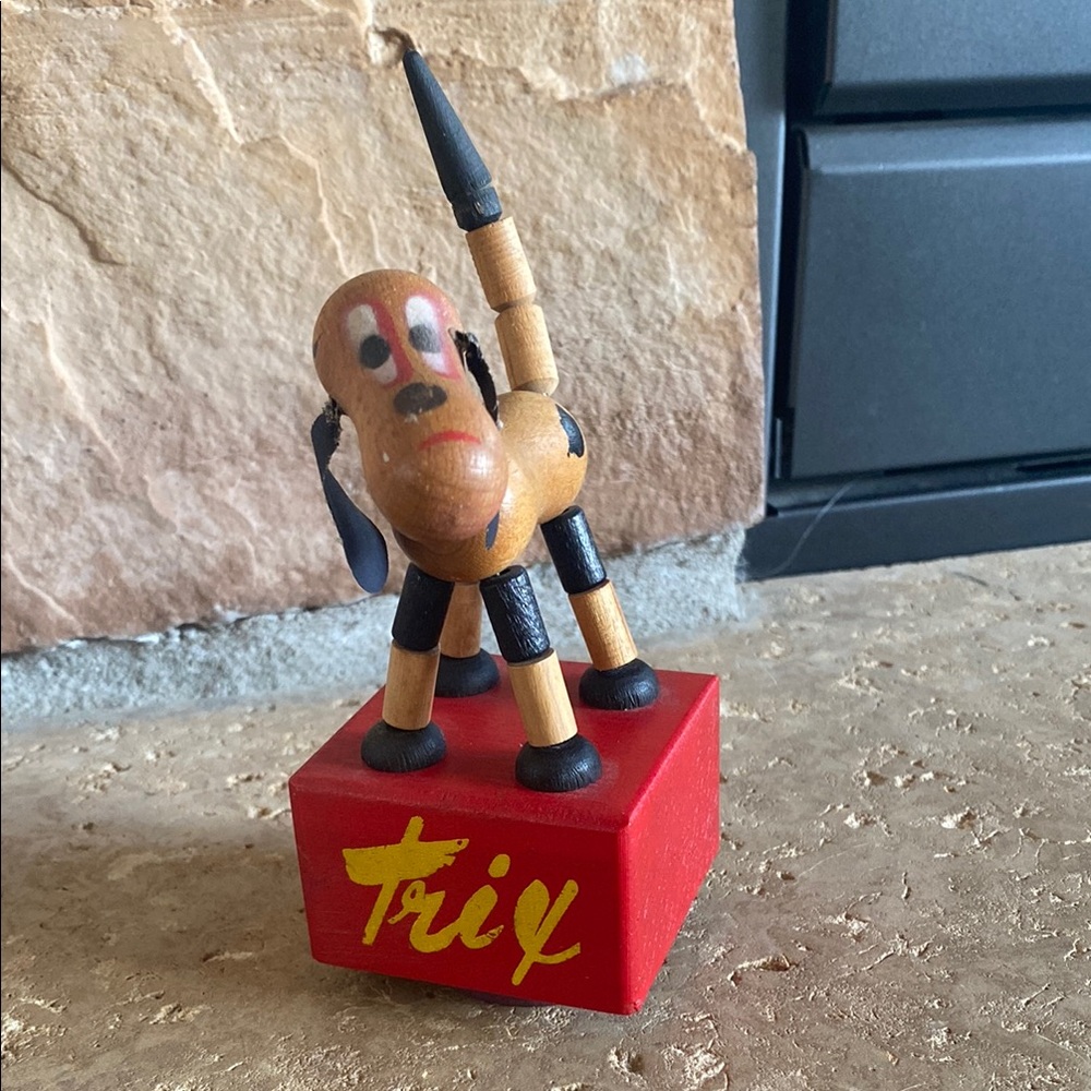 Antique 1930s Trix Wooden Rare push-up puppet toy Red base yellow lettering